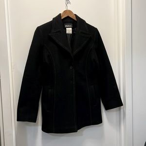 Smart casual women’s black wool coat.
